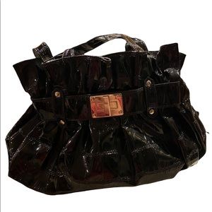 Patent black gathered purse with silver embellishments